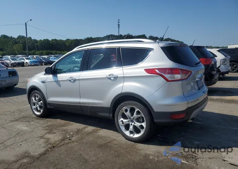 2016 Ford Escape Titanium z USA, uszkodzony, nr VIN 1FMCU0J93GUC64715